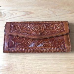 Vintage carved leather wallet